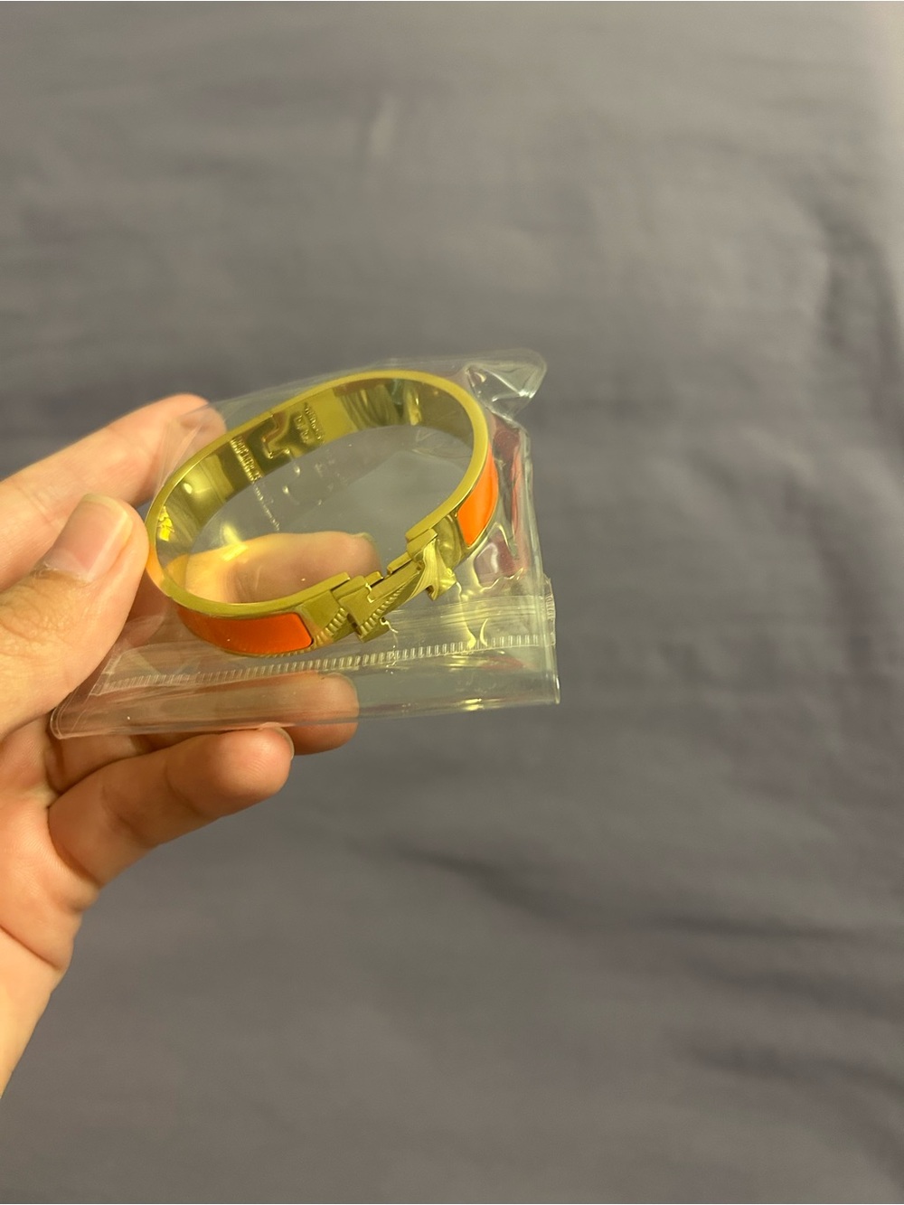 Gold Toned Bracelet with Orange Enamel Panel